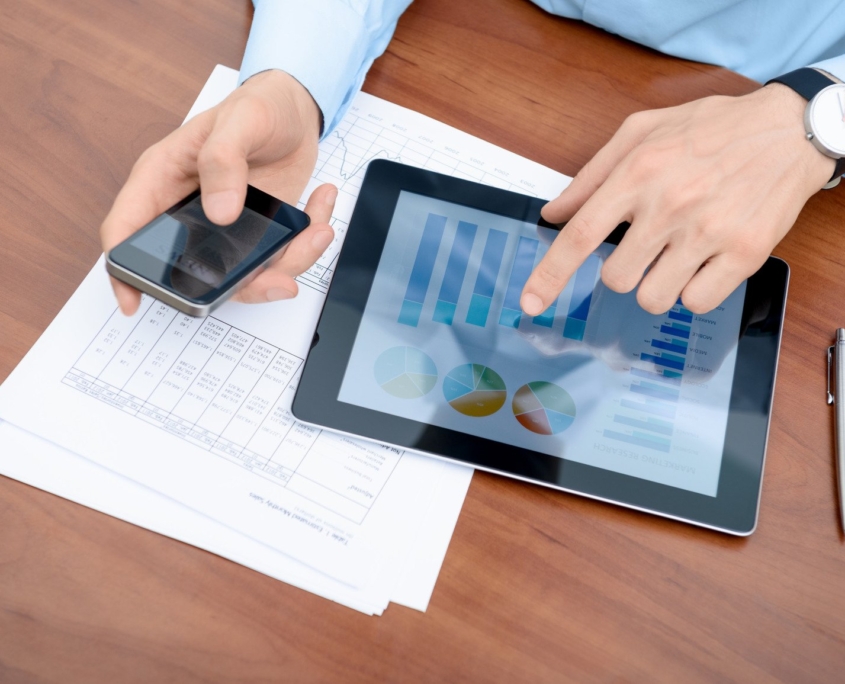 Man working with modern devices